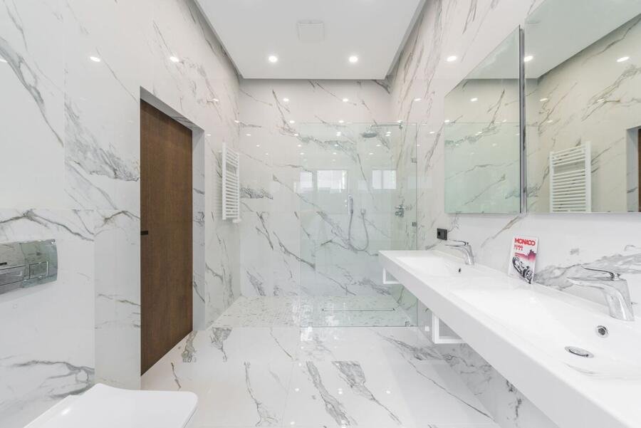 Modern marble bathroom with wall-mounted vanity