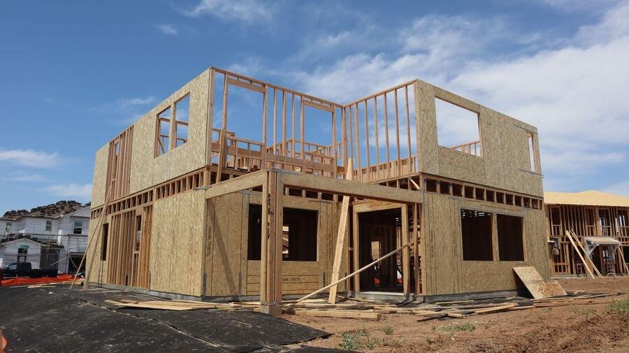 Precision timber framing of a two-storey home